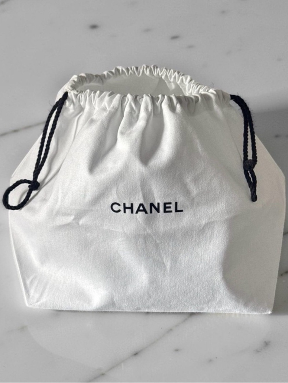 CHANEL White Drawstring Cosmetic Pouch with Black Rope - Authentic